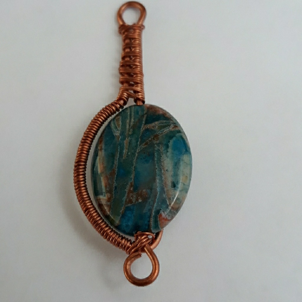 Handmade wire wrapped blue agate pendant
